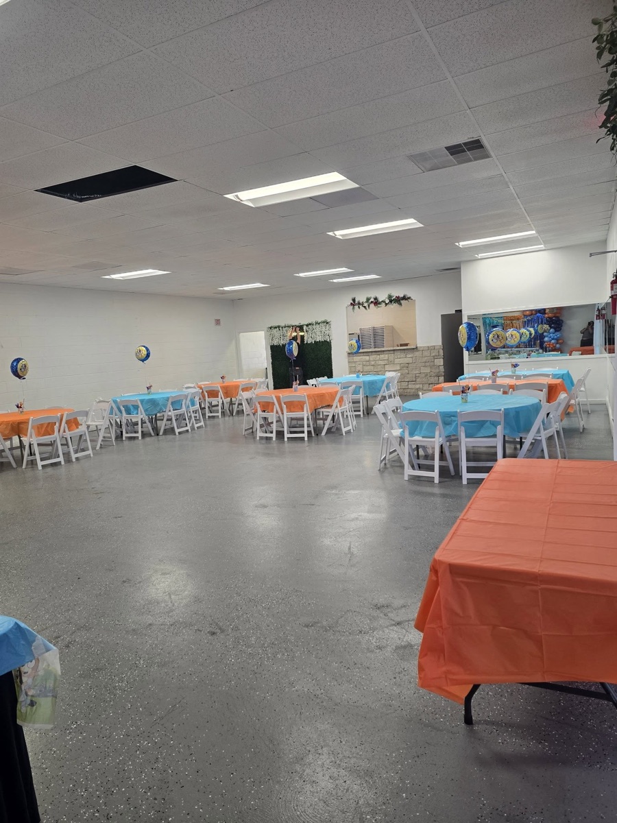 A children's birthday party in bright blue and orange